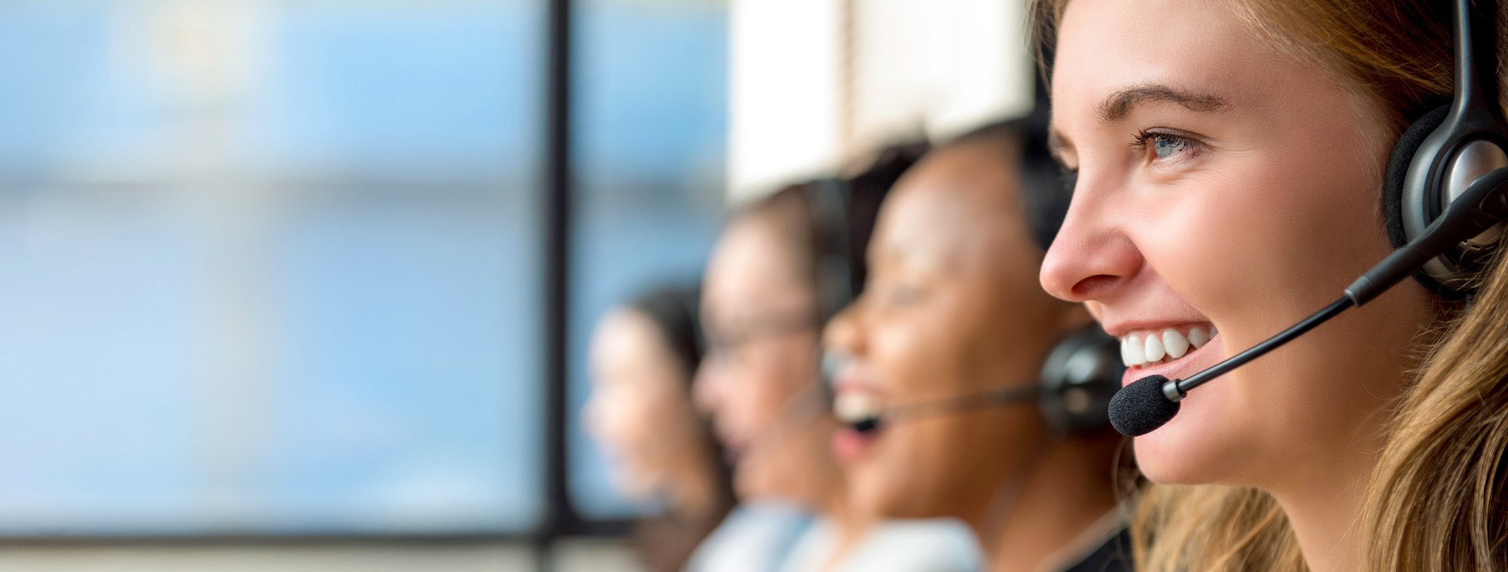 Woman customer service agents working in call center